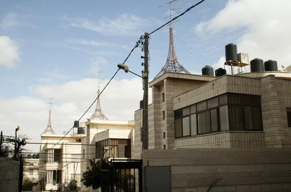 Ramallah rooftop aerial · nearest tower