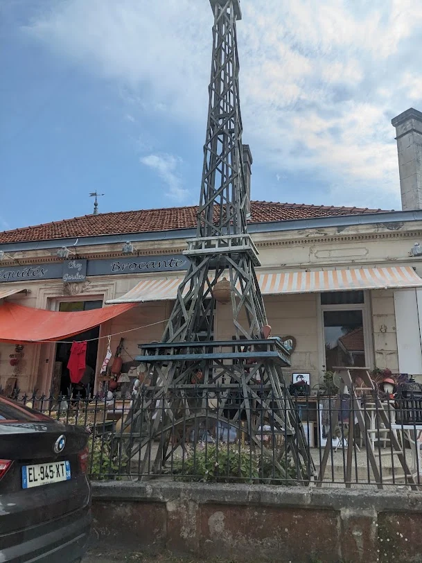 Wooden Eiffel replica at Chez Garden, Arès